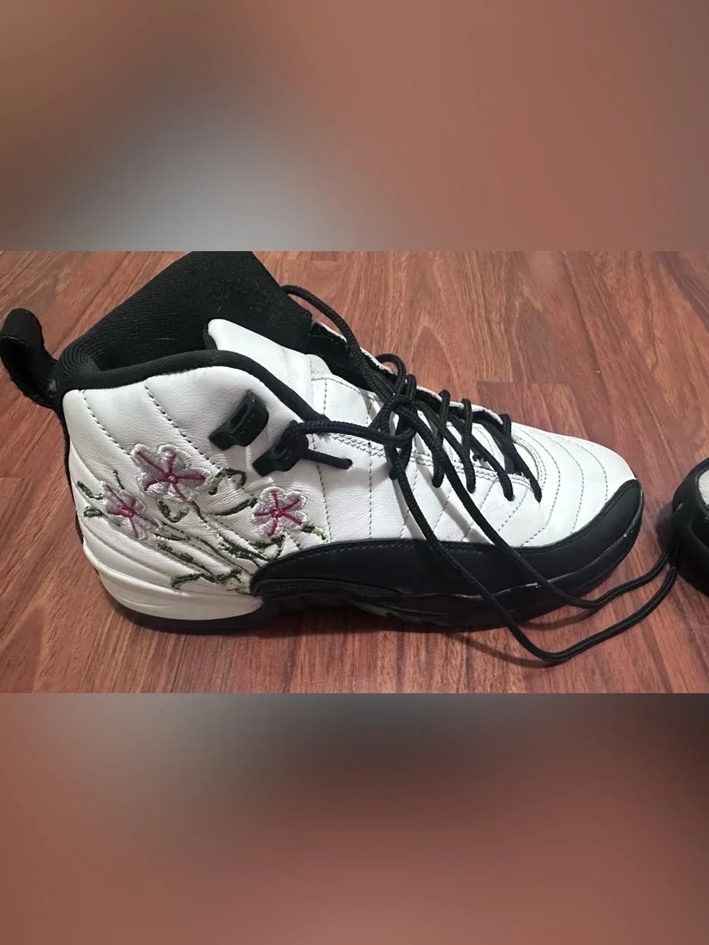 Jordan High-Top Sneakers in White and Black. Size 6.5 youth.